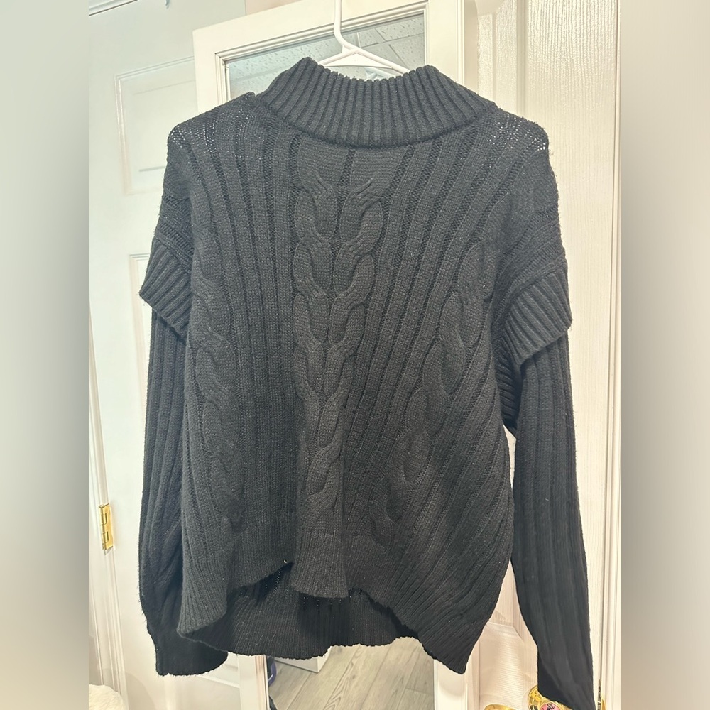 Black sweater, with tags